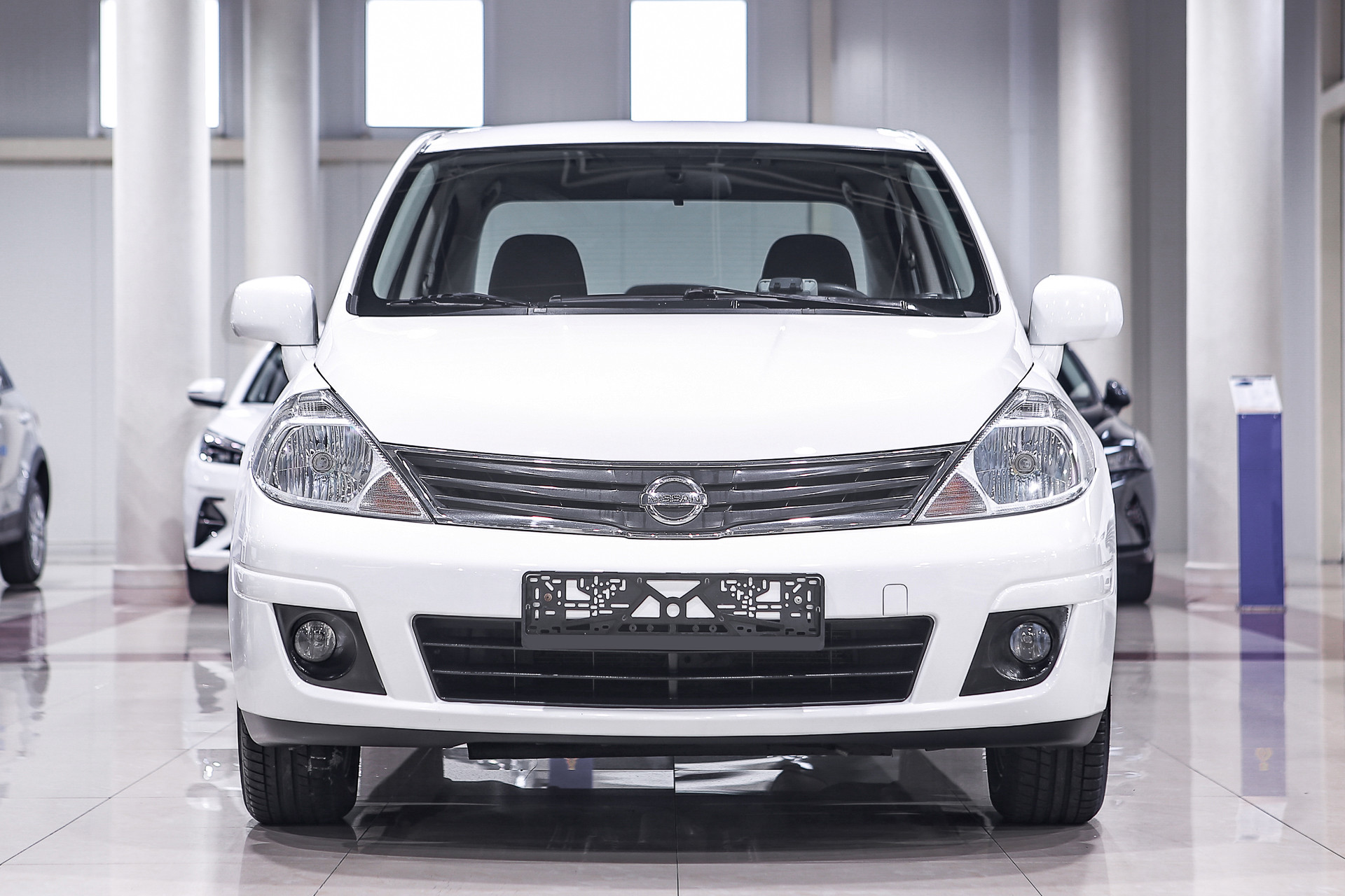 Купить Tiida с пробегом